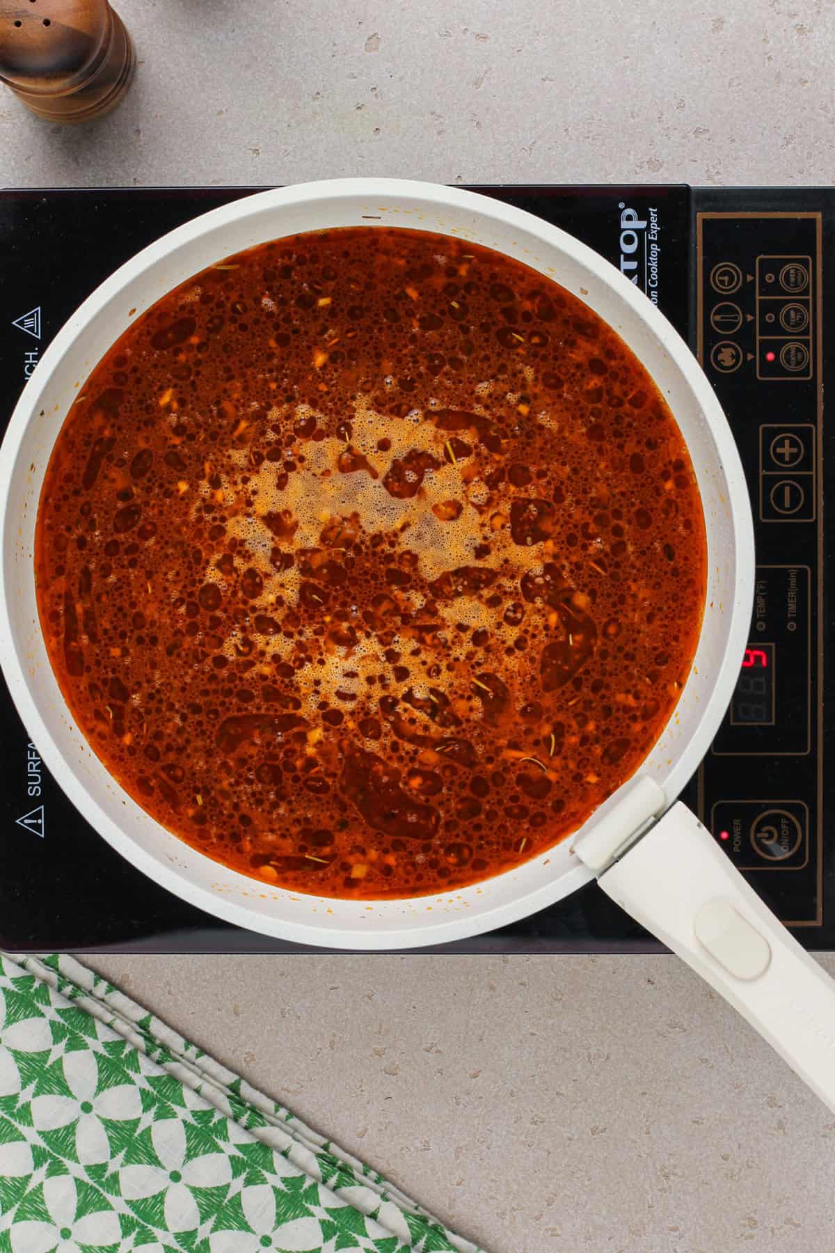 Homemade hamburger helper simmering in a skillet.