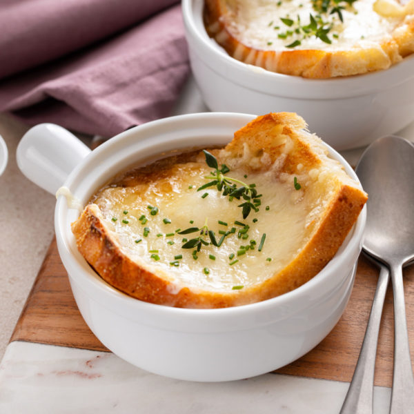 French onion soup in a white bowl.