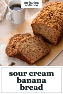 Sliced loaf of sour cream banana bread on a marble board next to a cup of coffee. Text overlay includes recipe name.