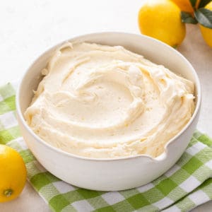 White bowl filled with lemon buttercream.