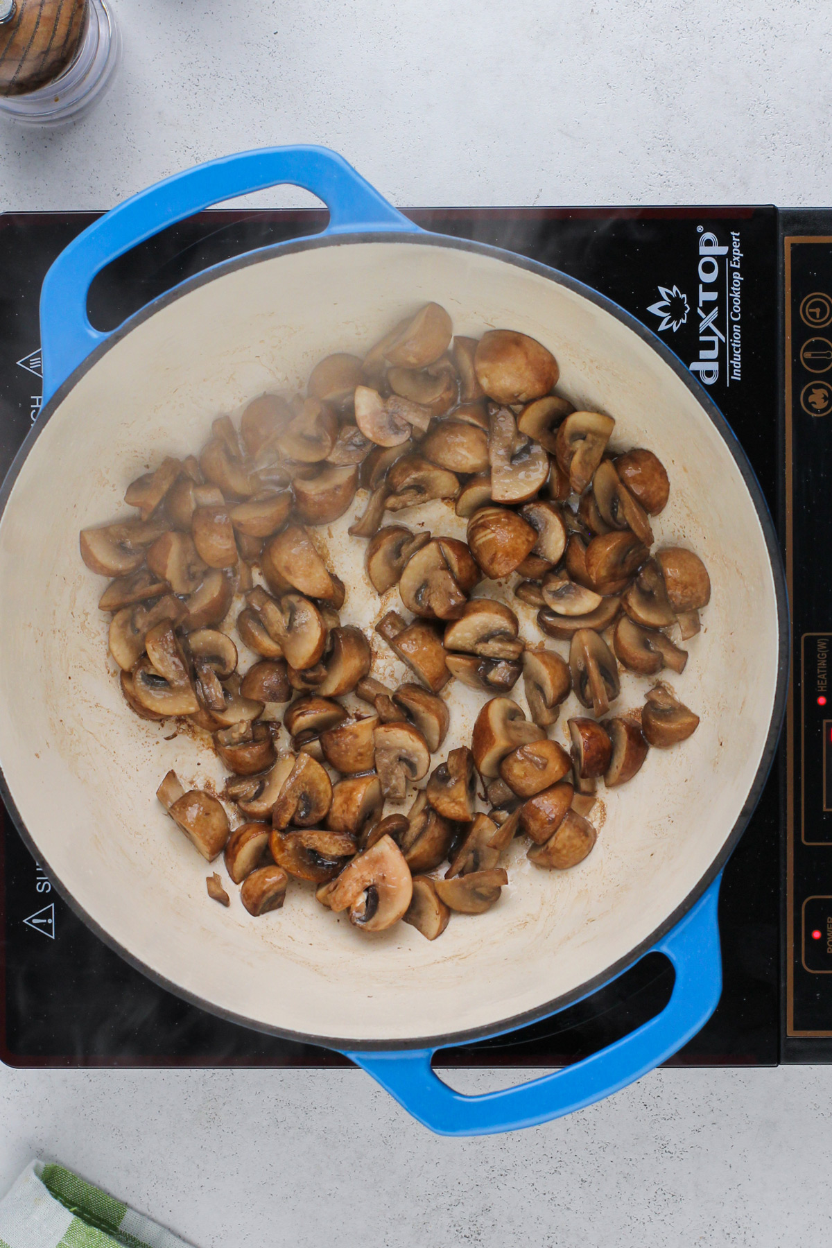 Sauteed mushrooms in a dutch oven.