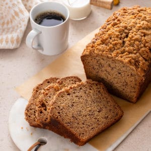 Sliced loaf of sour cream banana bread.