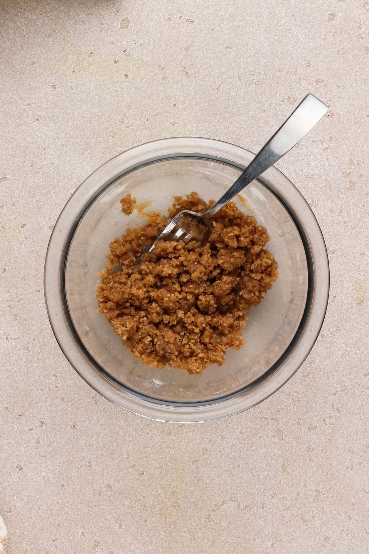 Streusel topping for banana bread in a glass bowl.